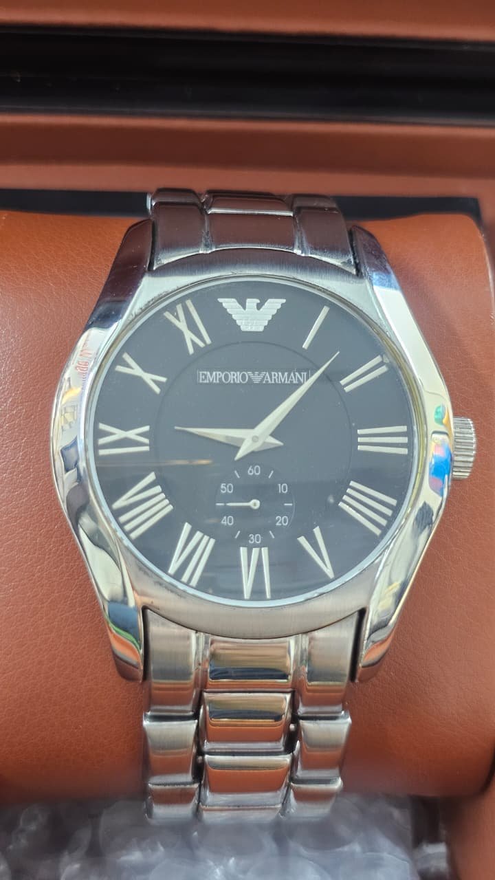 WhatsApp Image 2025-12-01 at 5.48.12 PM Emporio Armani Valente AR0680 men's watch with a black dial and stainless steel band(Used) - Image 1