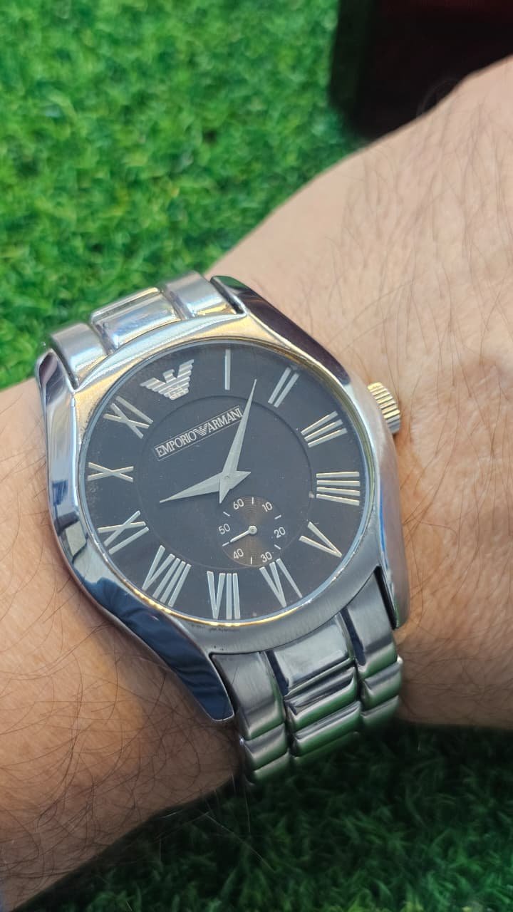 WhatsApp Image 2025-12-01 at 5.48.13 PM Emporio Armani Valente AR0680 men's watch with a black dial and stainless steel band(Used) - Image 2