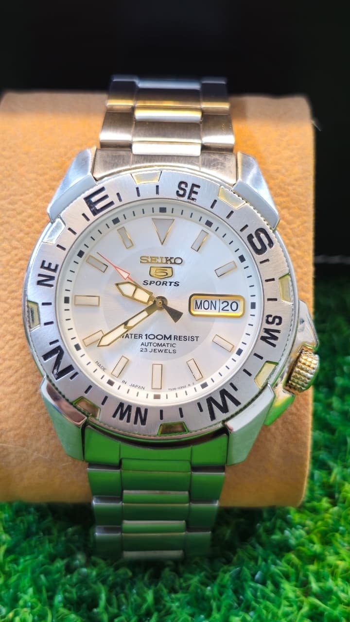 WhatsApp Image 2026-01-16 at 4.01.40 PM Seiko 5 Sports Navigator Automatic 7s36 caliber 23-jewels japan made White 42mm dial watch for Men's (Used) - Image 1