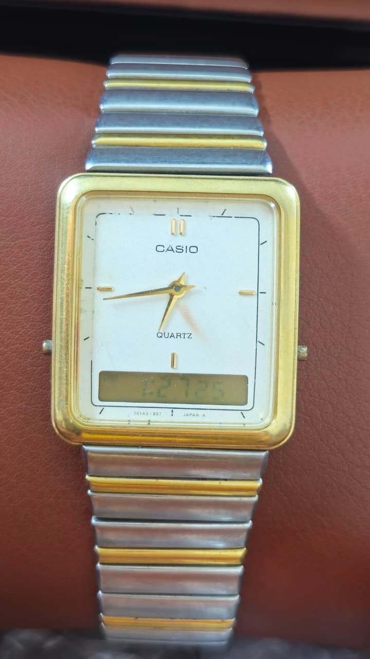 WhatsApp Image 2026-01-24 at 4.57.15 PM Vintage Casio AQ-705, a classic "ana-digi" (analog-digital) Quartz movement Japan made Men's watch (Used ) - Image 1