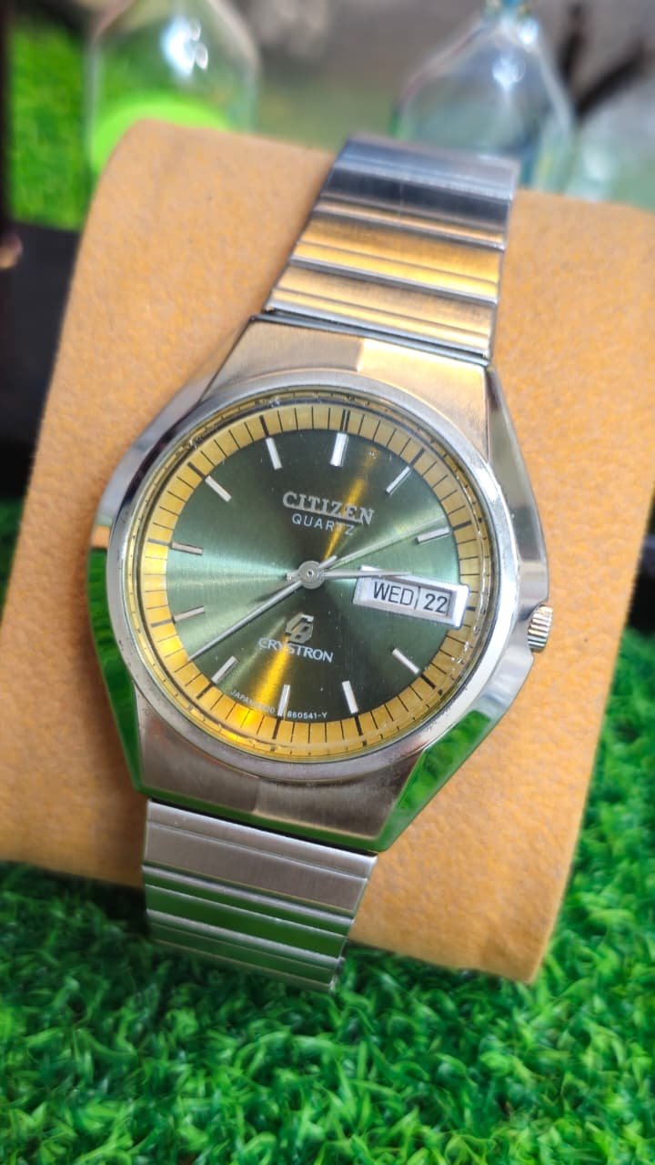 WhatsApp Image 2026-07-08 at 1.02.33 PM Vintage Citizen Crystron Quartz — Green Sunburst Dial, Day-Date Japan made Men’s watch (Used) - Image 1