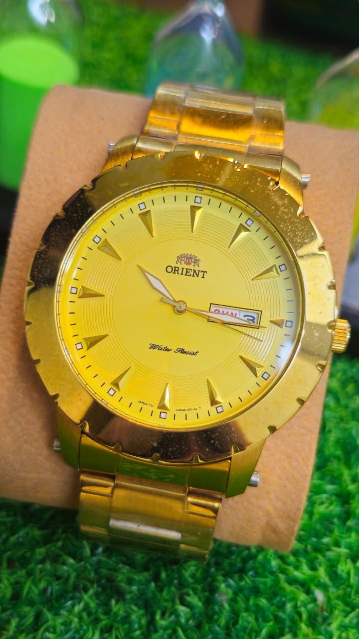 WhatsApp Image 2026-07-08 at 6.09.21 PM ORIENT GOLD-TONE DAY-DATE — Ref. UND7/UND8 Quartz movement Japan made Men's watch (New) - Image 1