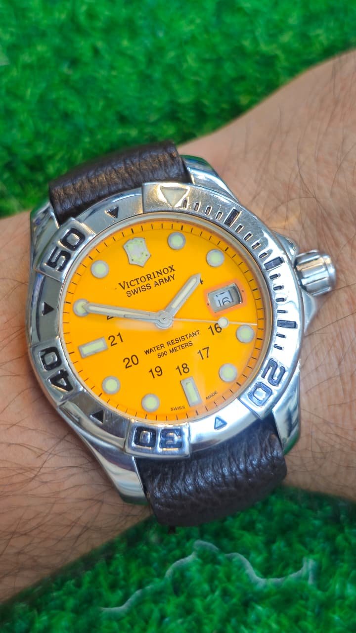 WhatsApp Image 2026-07-10 at 9.58.33 AM Victorinox Swiss Army Dive 500M Watch — Yellow Dial Quartz Movement Switzerland 🇨🇭 made Men's watch (Used) - Image 2